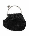 Bolsa vintage preta estilo saco com aplicações de fetos e missangas.