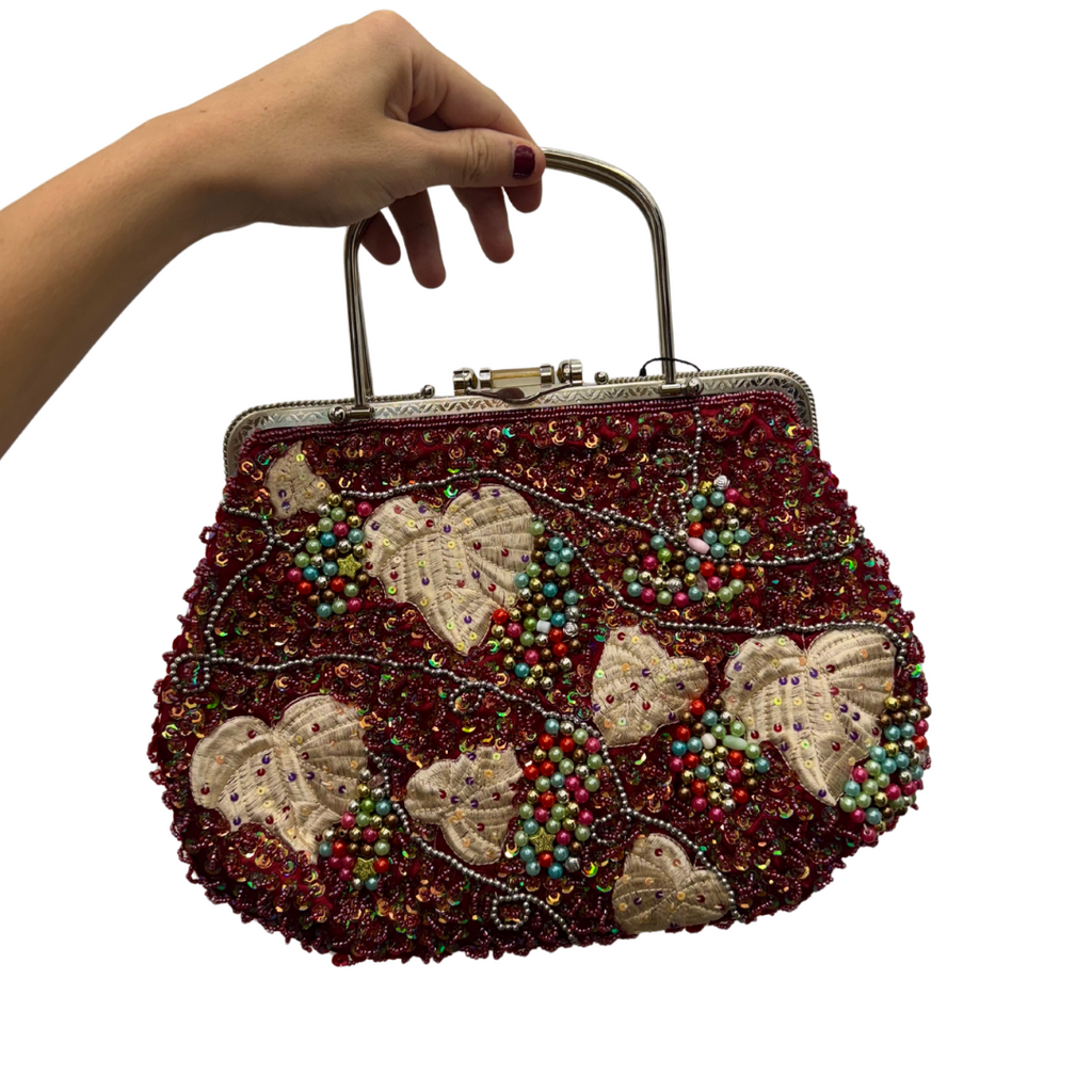 Bolsa vintage estilo balde com bordado de folhas