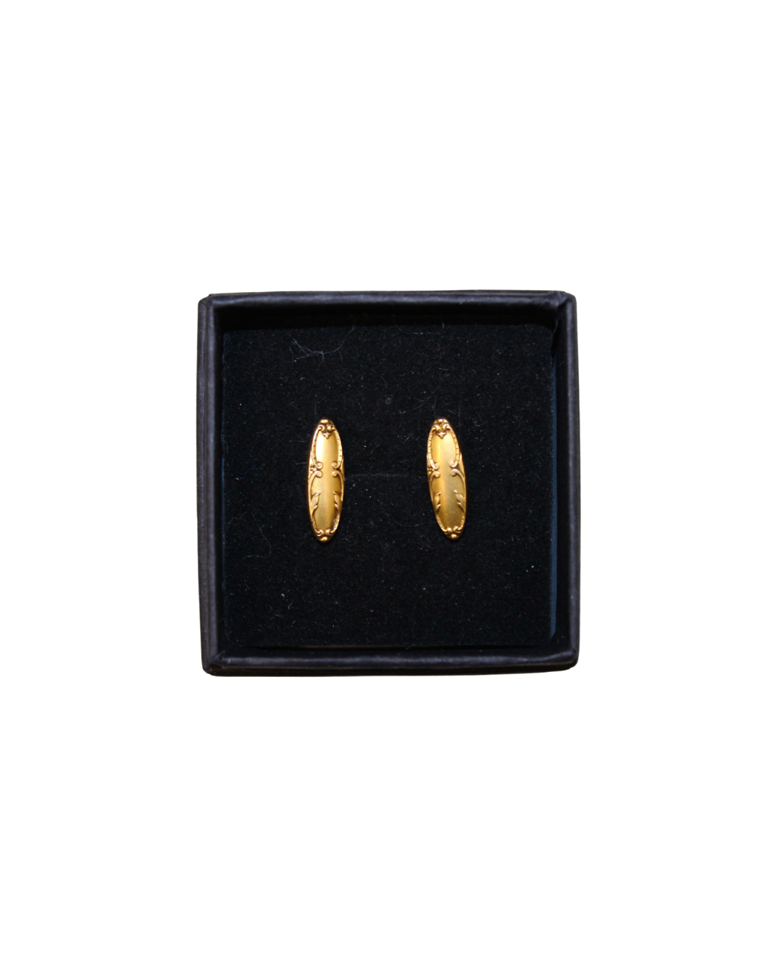 Gemelos vintage dorados con dibujos de yeserías