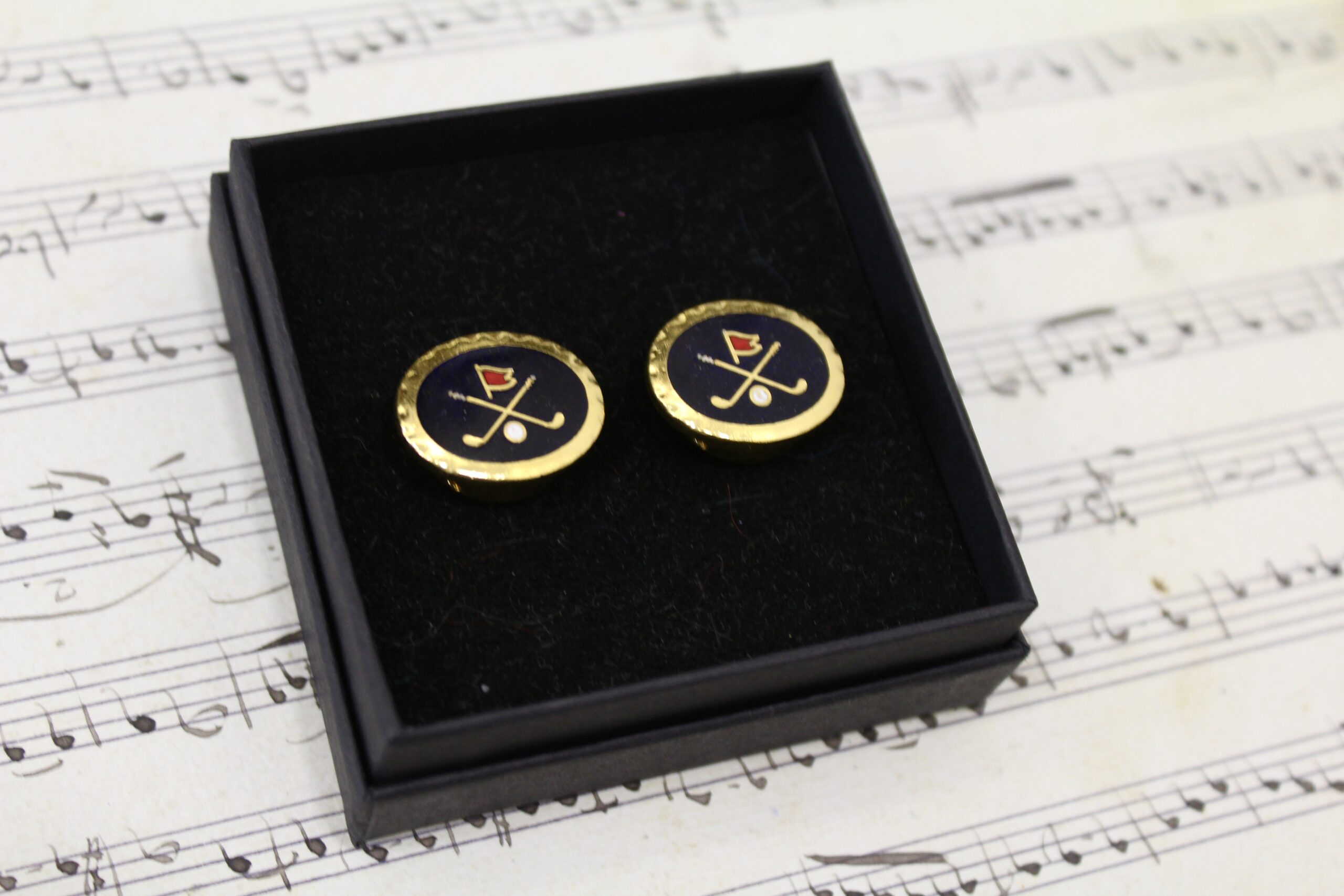 Gemelos vintage de Golf con filo dorado