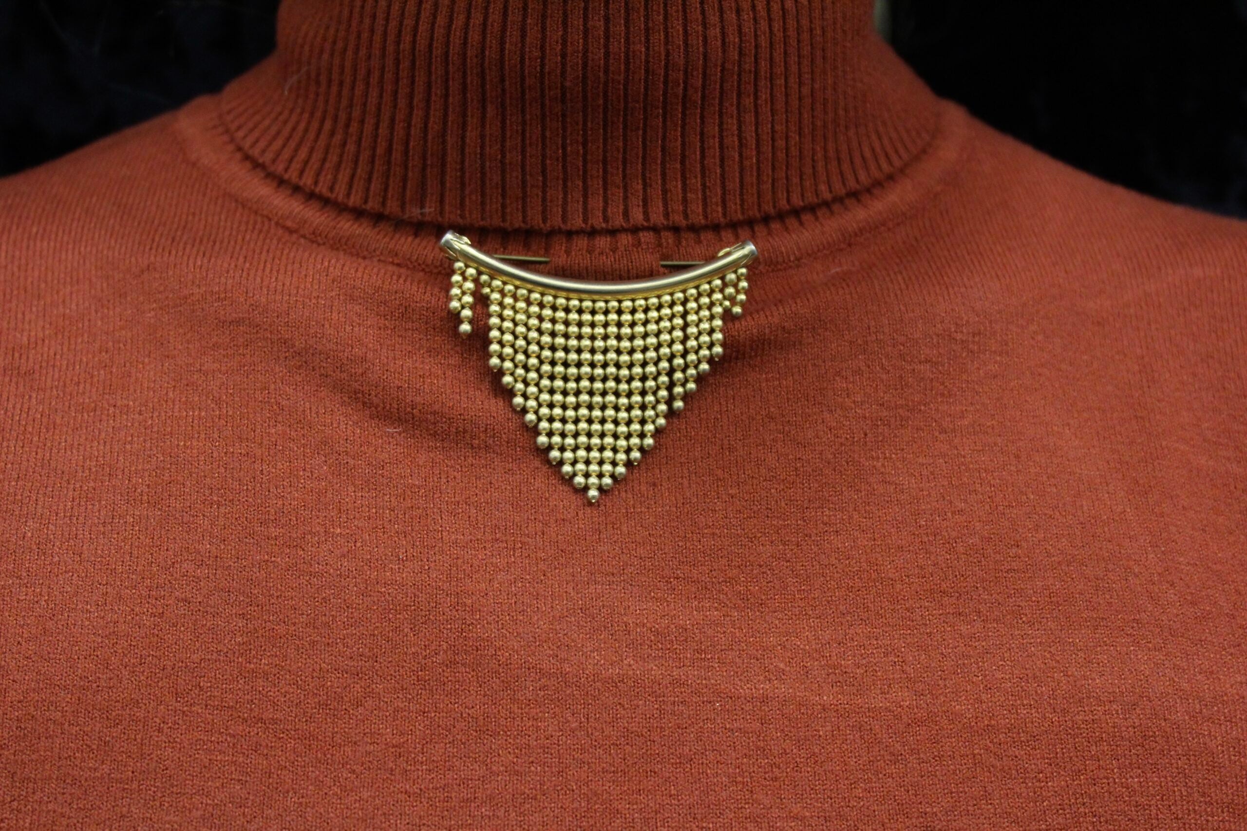 Broche vintage francés cascada dorada