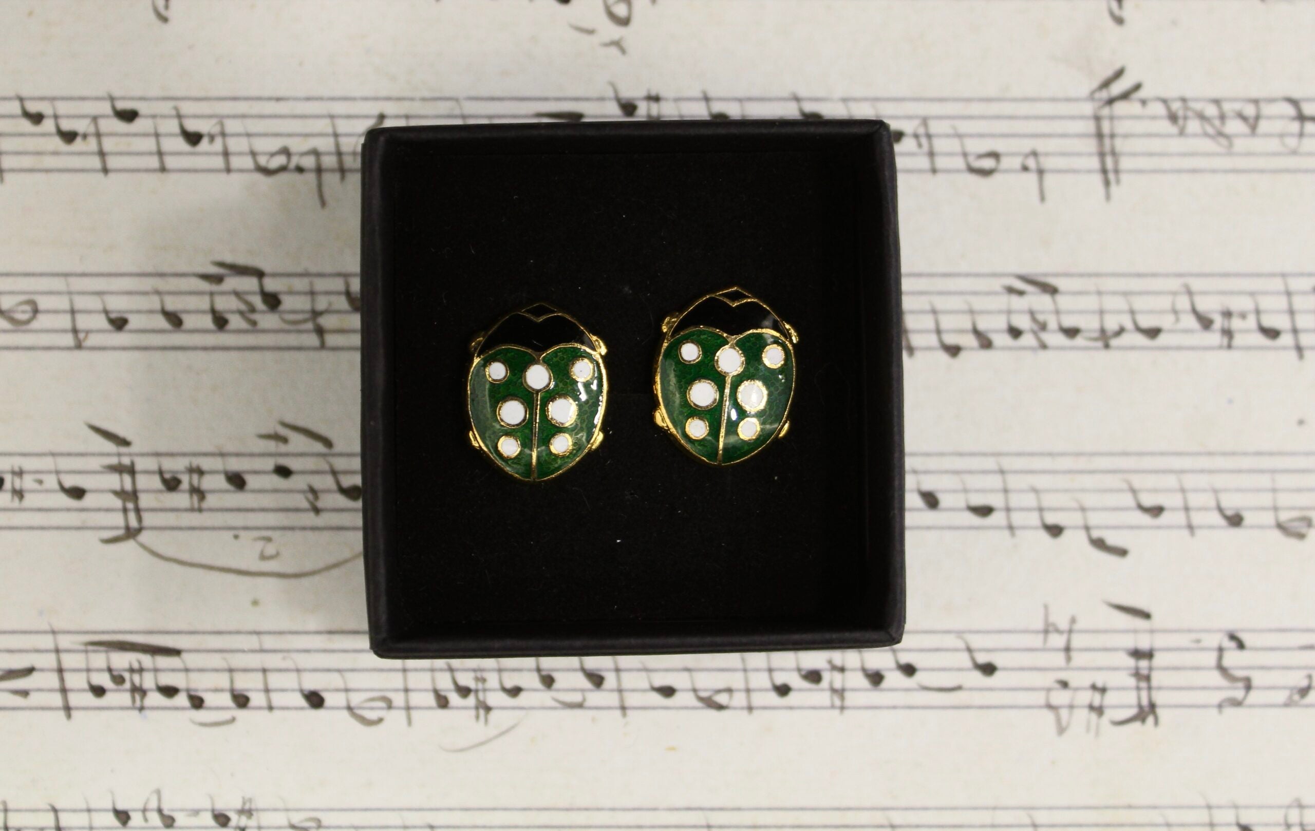 Gemelos vintage de escarabajo verde esmaltados