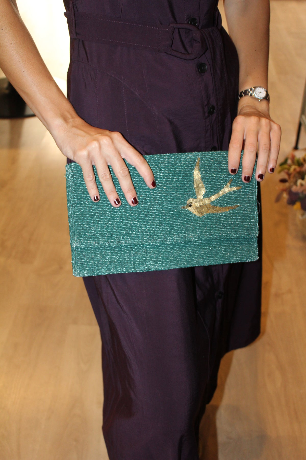 Bolso vintage tipo cartera azul con pájaro