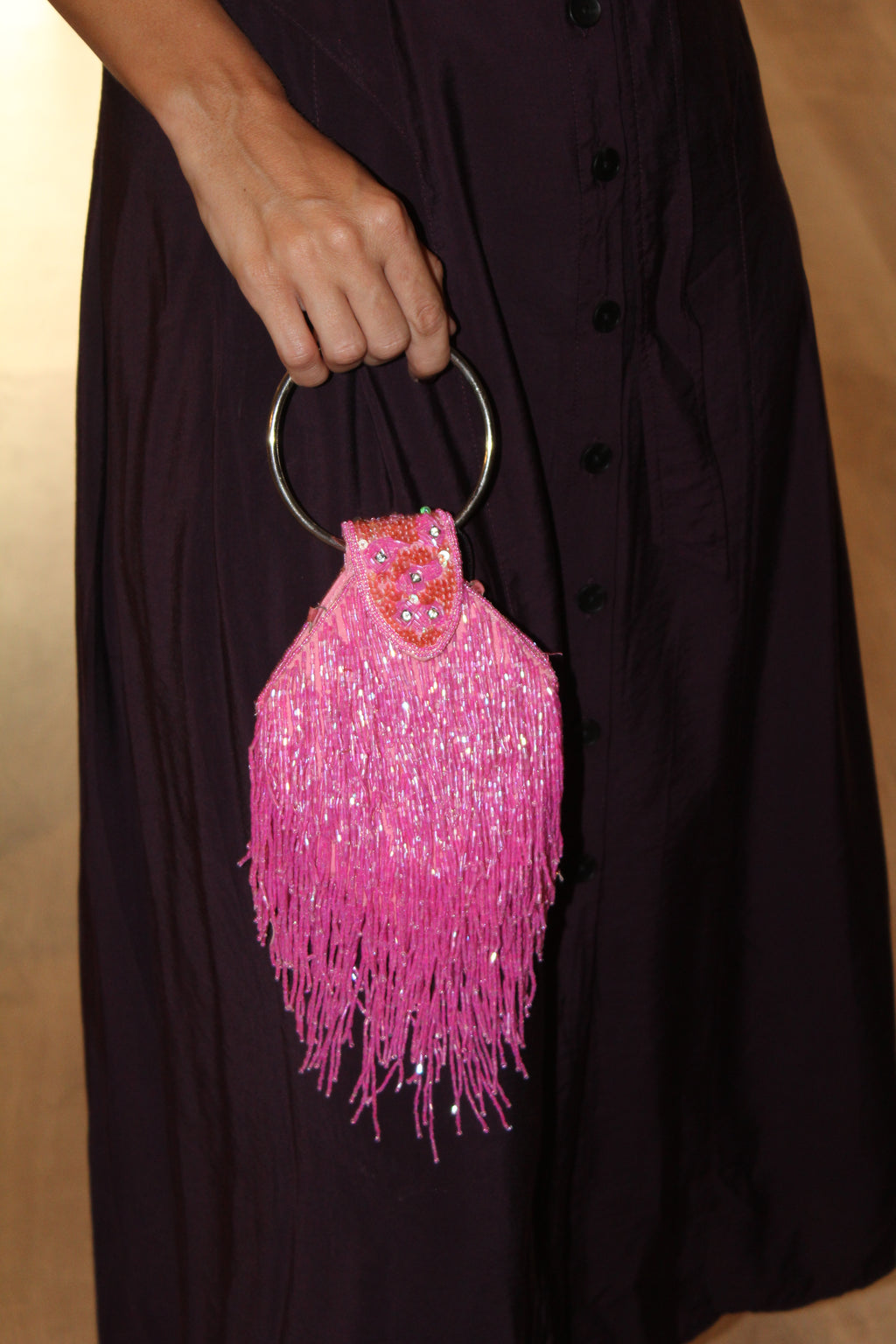 Bolso vintage rosa con flecos