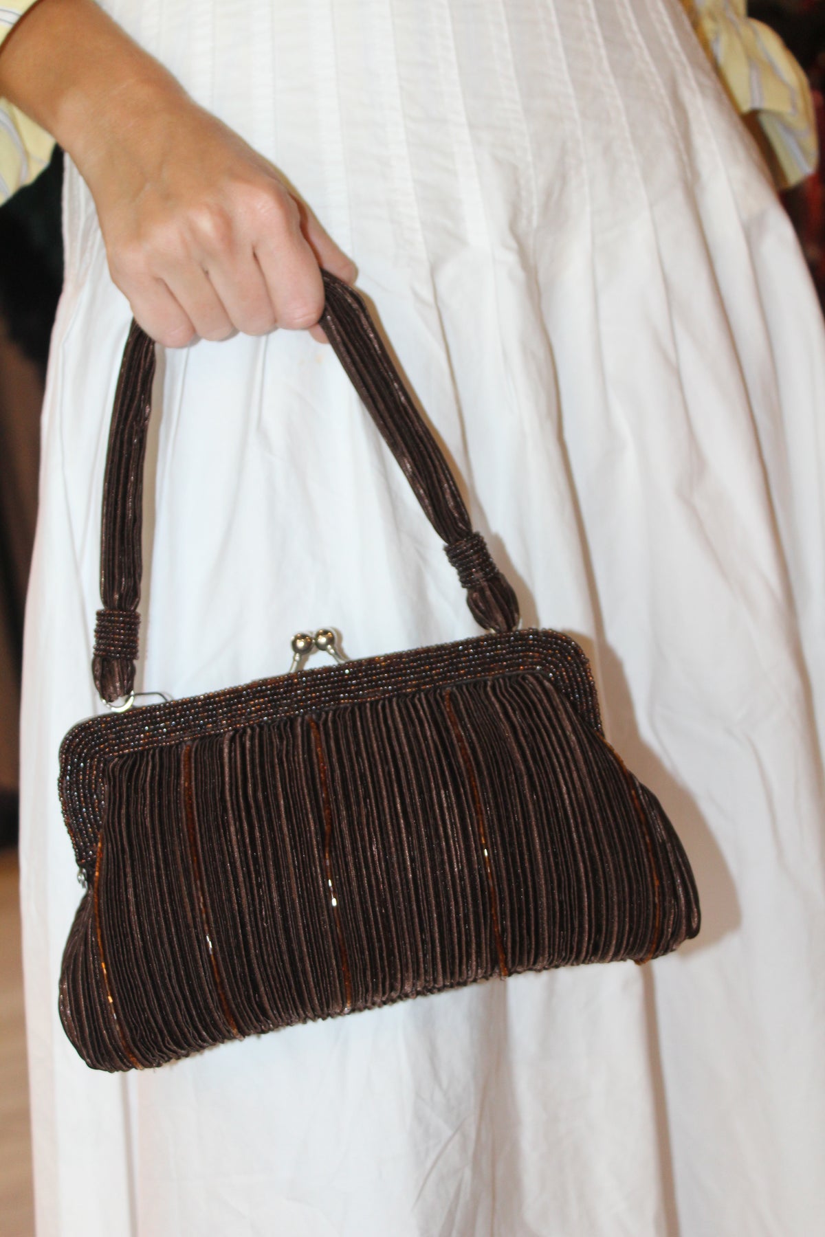 Bolso vintage marrón con asa