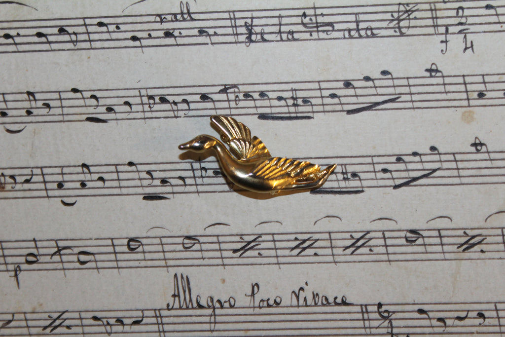 Broche vintage em folha de ouro