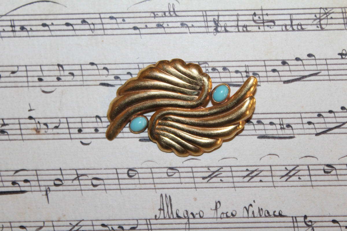 Broche vintage em folha de ouro