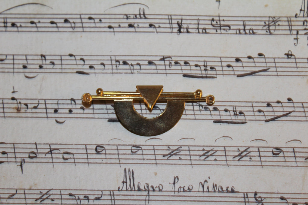Broche vintage em folha de ouro