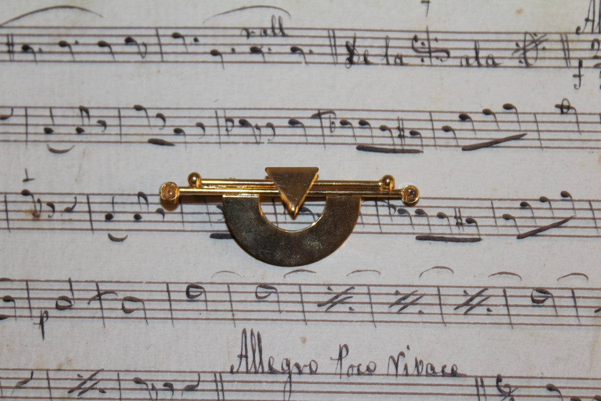 Broche vintage em folha de ouro