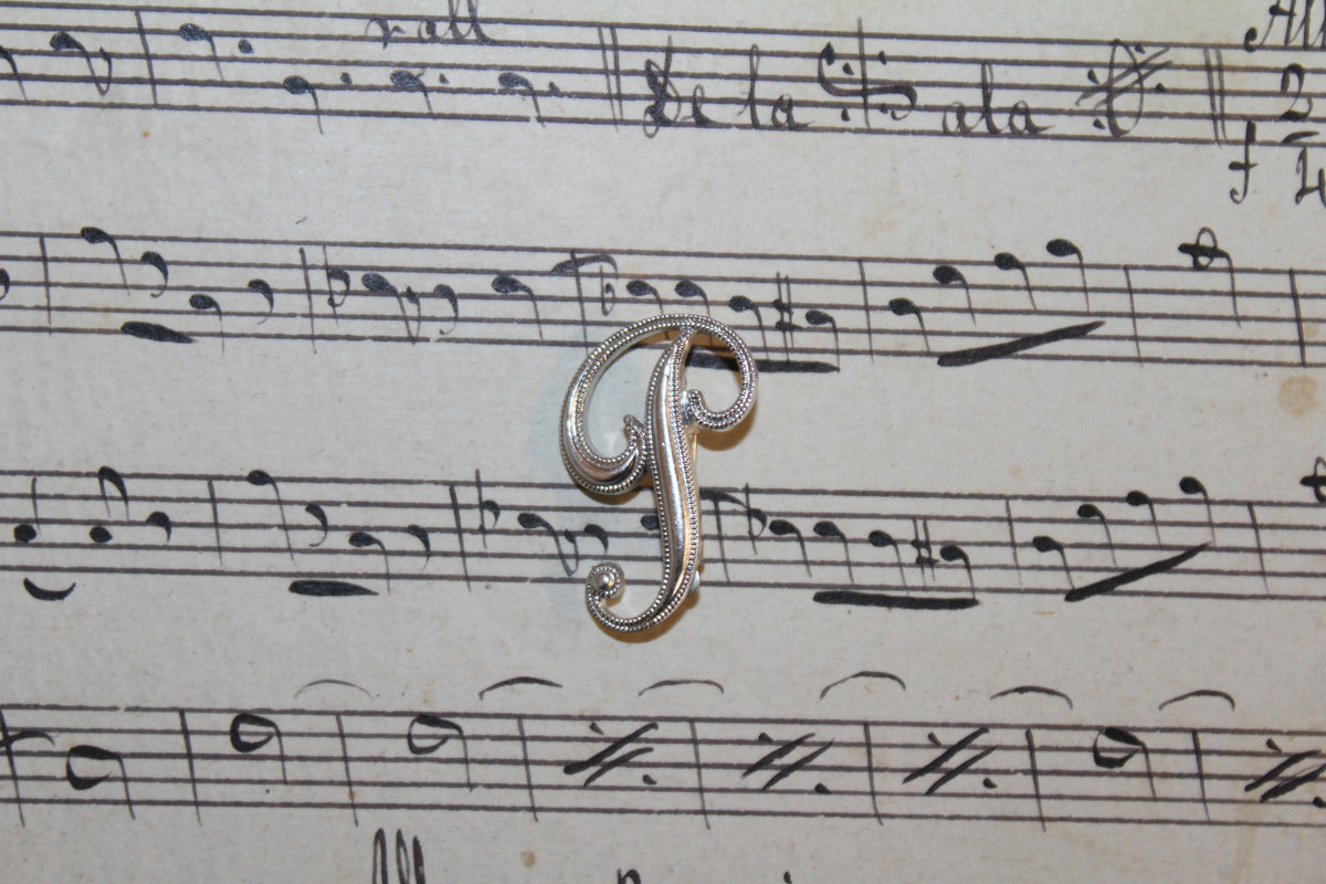Broche vintage em folha de ouro