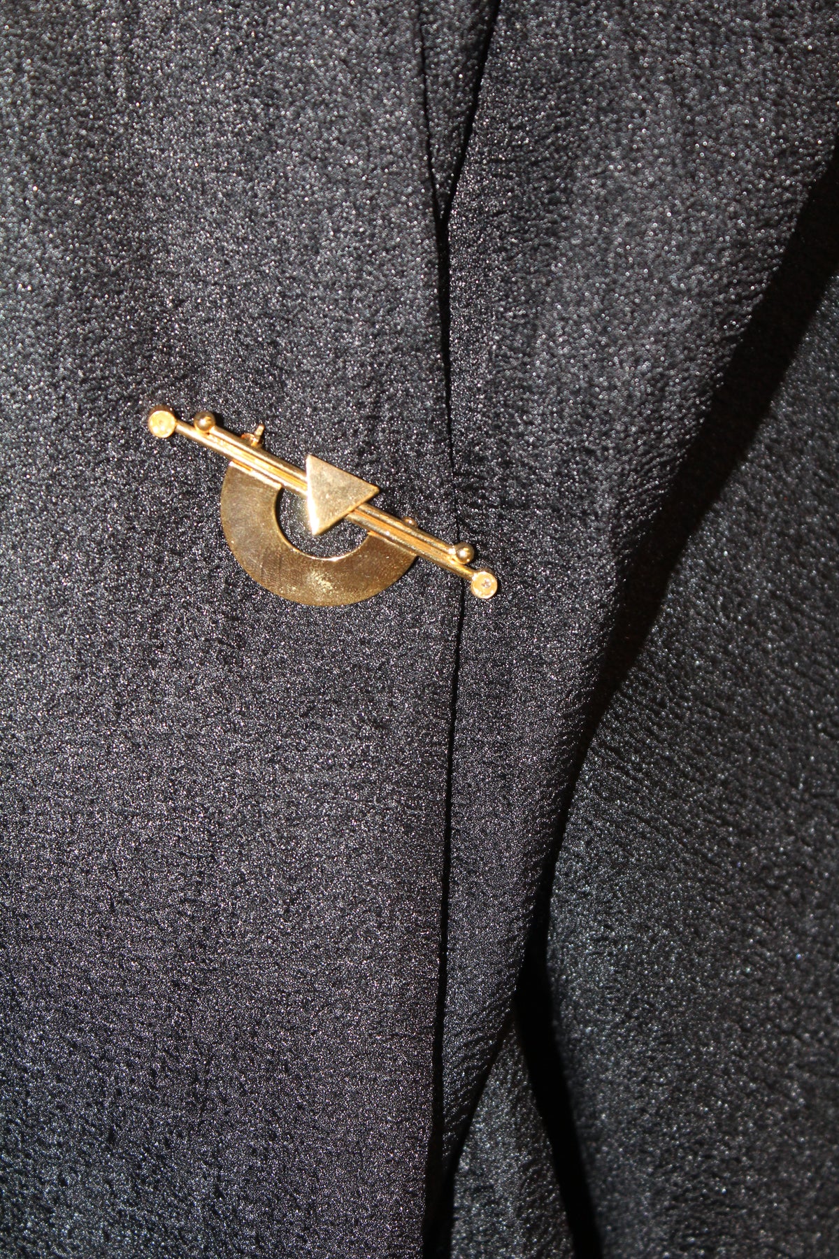Broche vintage em folha de ouro
