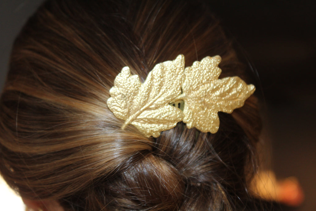Broche vintage em folha de ouro