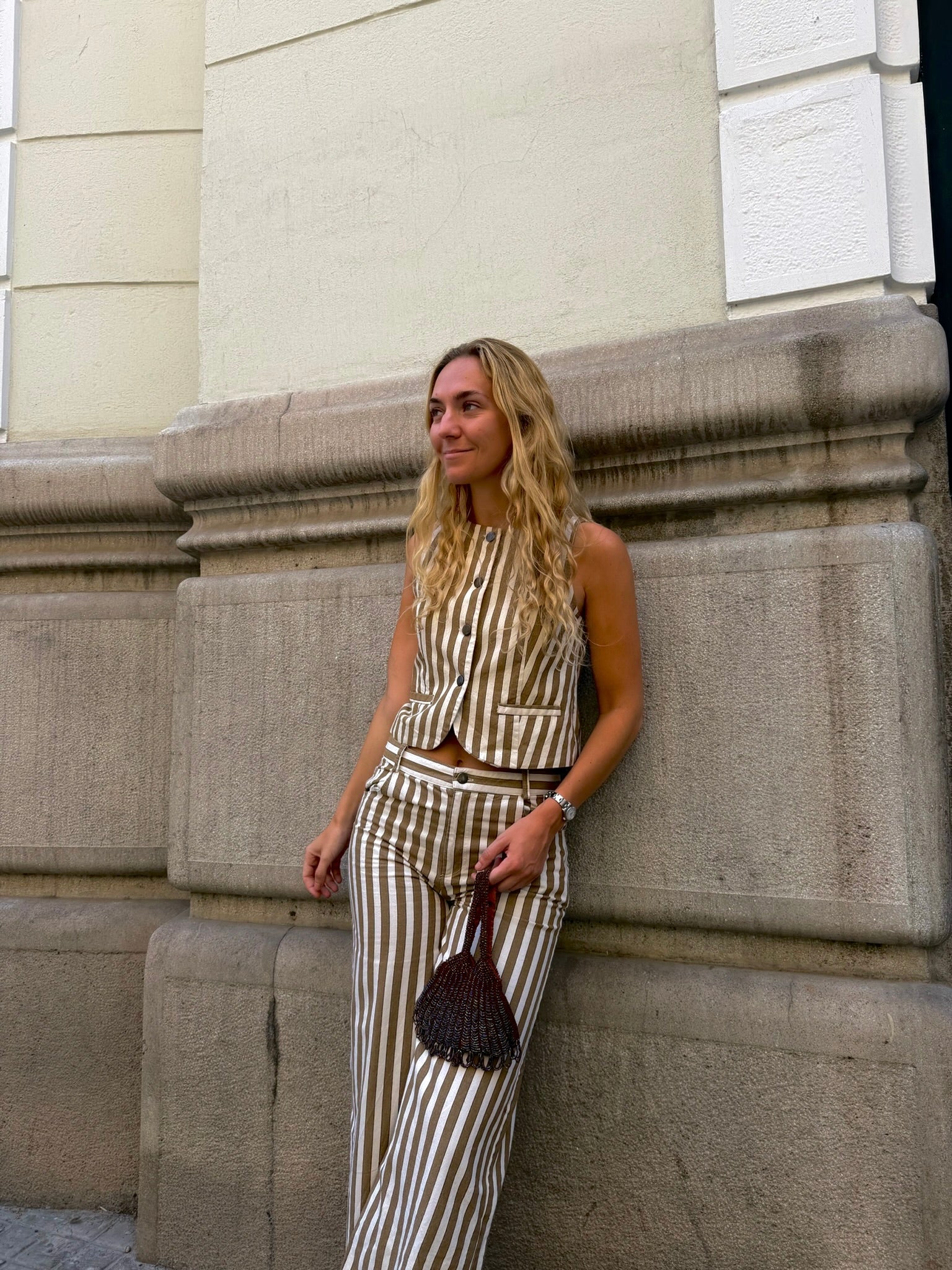 Bolso vintage marrón tipo años 20 de cuentas y acabado en flecos triangular